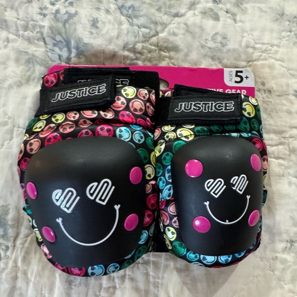 Justice Black Knee Pads with Colorful Smiley Faces - Picture 1 of 3
